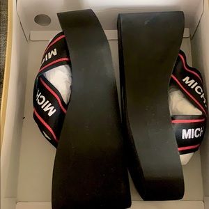 Size 9 black and red wedge micheal kors flip flop
